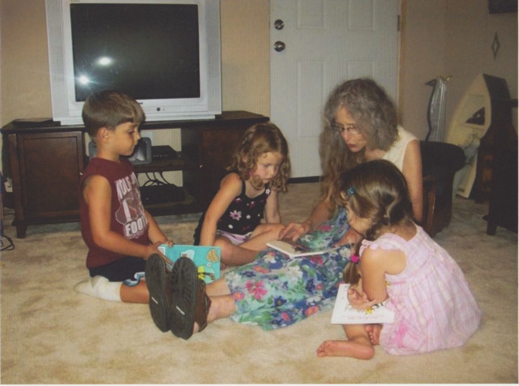 Linda Lucas Walling is reading to a group of children